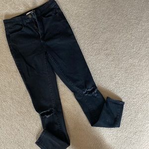 Dark black distressed jeggings